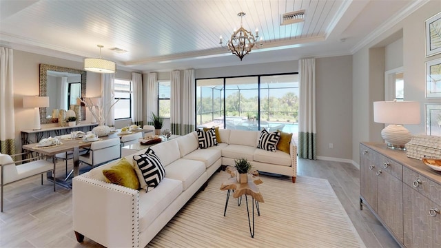 living room with wood ceiling, a notable chandelier, and crown molding