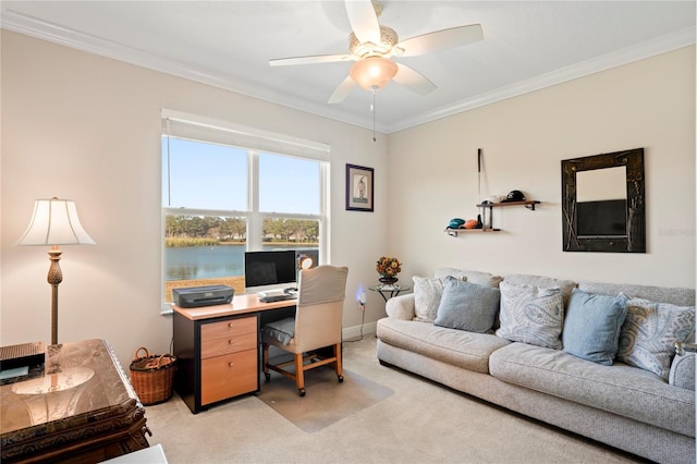 office space with crown molding, light colored carpet, and ceiling fan