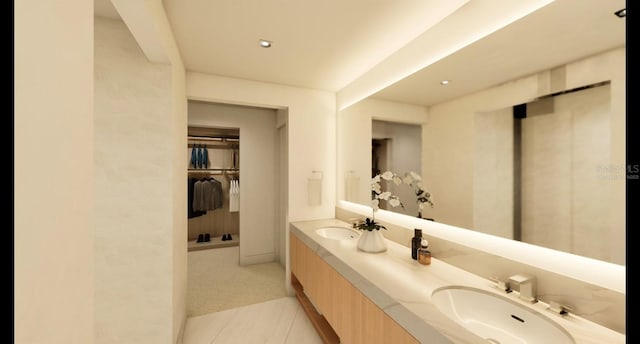 bathroom with tile patterned flooring and vanity