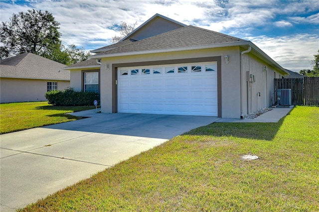 view of property exterior with a garage, central air condition unit, and a lawn