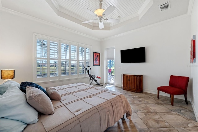 bedroom featuring crown molding, ceiling fan, a tray ceiling, and access to exterior