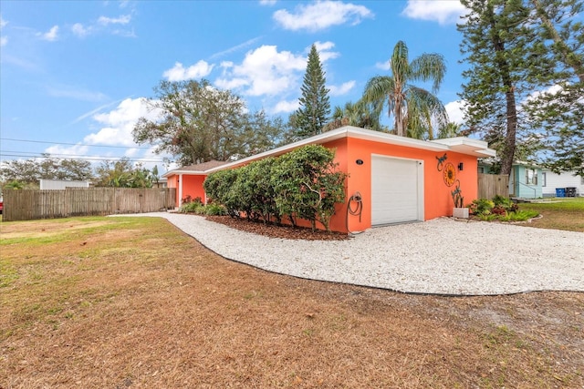 garage with a lawn