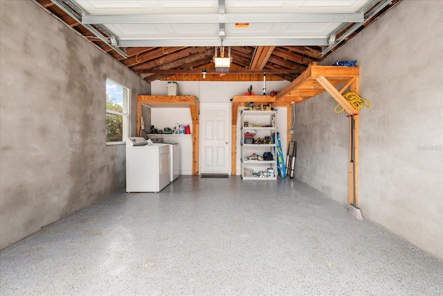 garage featuring washer and clothes dryer