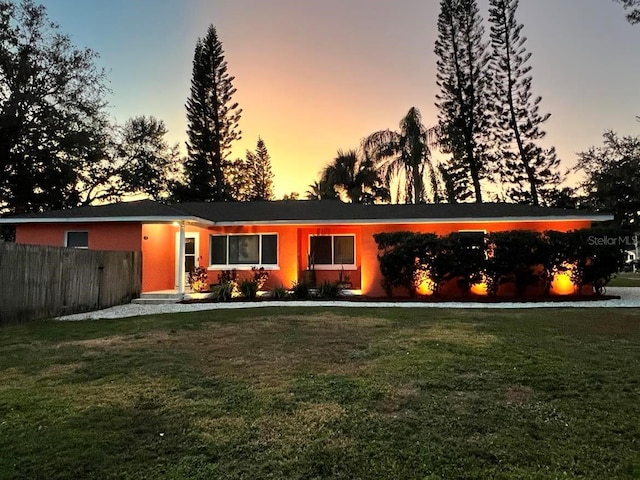 view of front facade with a yard