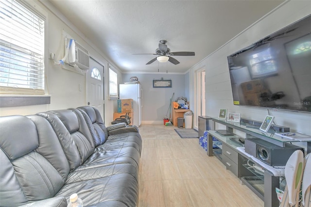 living room featuring crown molding, ceiling fan, and a wall mounted air conditioner