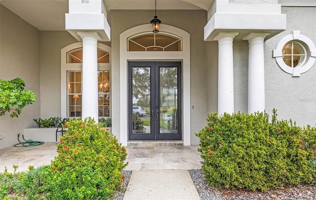 doorway to property featuring french doors