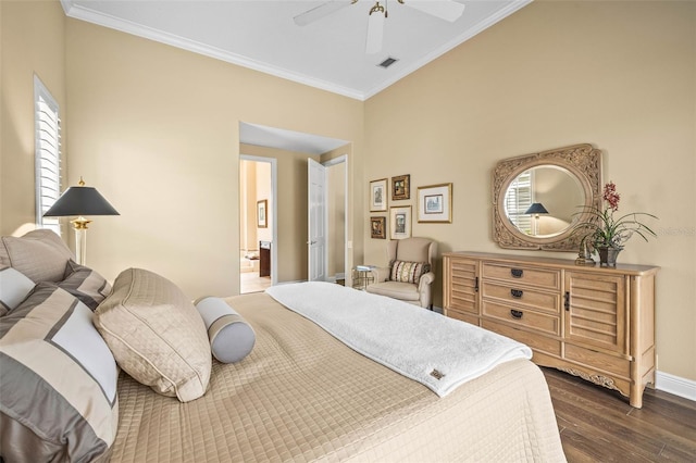 bedroom with dark hardwood / wood-style flooring, connected bathroom, ornamental molding, and ceiling fan