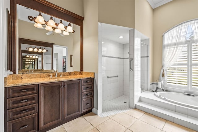 bathroom featuring vanity, plus walk in shower, and tile patterned flooring