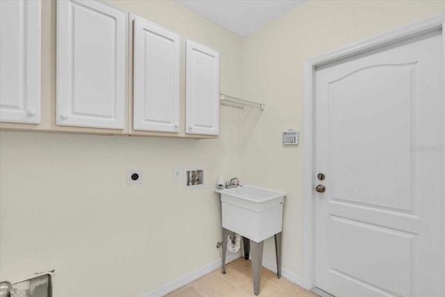 washroom with washer hookup, cabinets, and hookup for an electric dryer