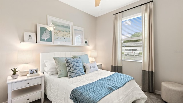 carpeted bedroom featuring ceiling fan