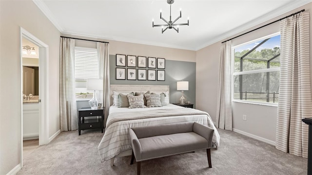 bedroom featuring connected bathroom, crown molding, light colored carpet, and a chandelier