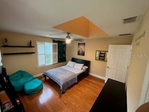 bedroom featuring ceiling fan and hardwood / wood-style floors