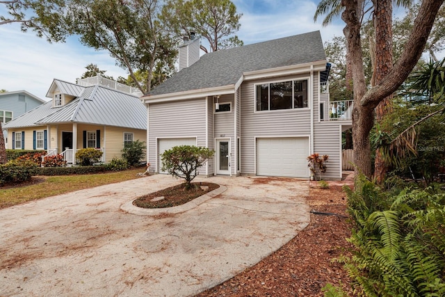 front facade with a garage