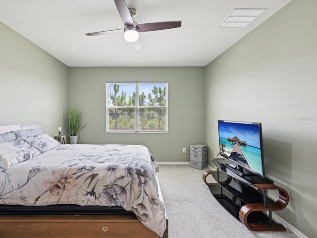 bedroom featuring ceiling fan and carpet floors