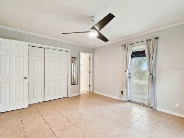 unfurnished bedroom featuring ceiling fan, access to outside, light tile patterned flooring, crown molding, and a closet