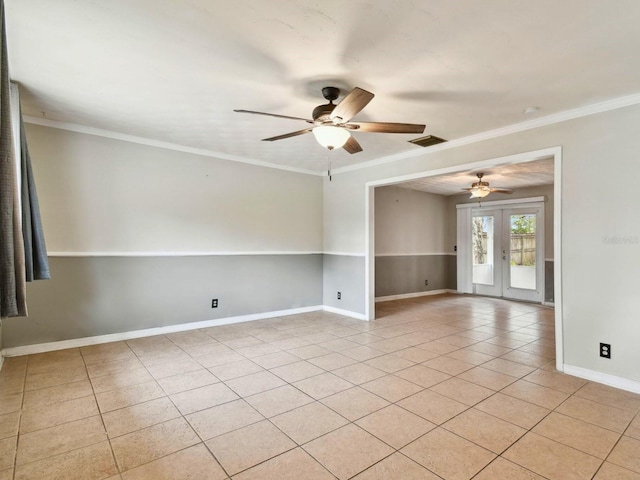 unfurnished room featuring ceiling fan, light tile patterned floors, ornamental molding, and french doors