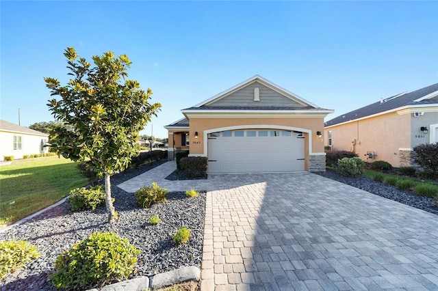 view of front of property featuring a garage