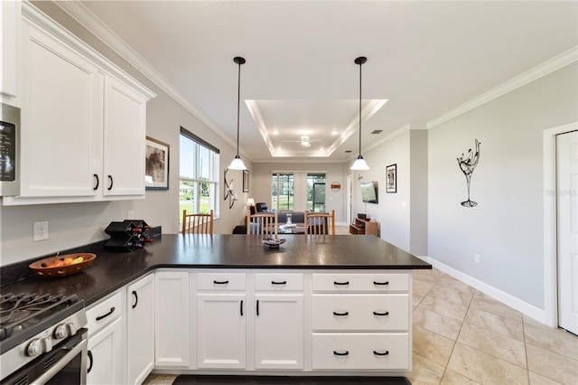 kitchen with kitchen peninsula, white cabinetry, light tile patterned floors, and hanging light fixtures