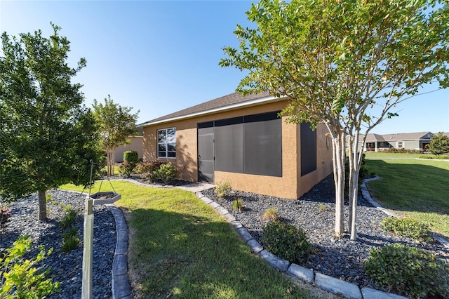 exterior space with a front yard