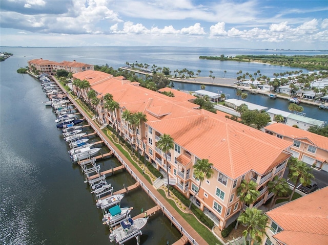 birds eye view of property featuring a water view