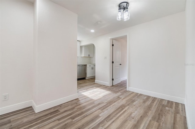 empty room with light wood-type flooring