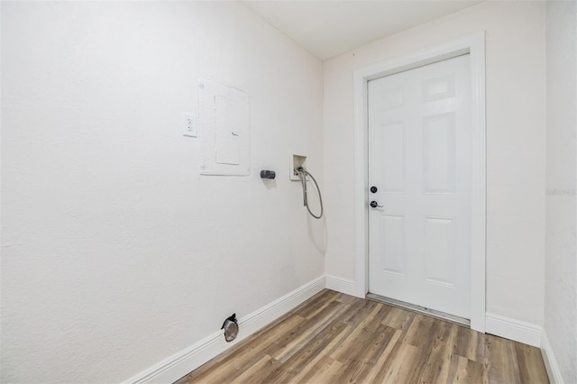 doorway featuring wood-type flooring and electric panel