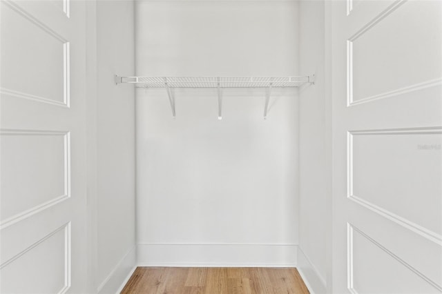 walk in closet featuring light hardwood / wood-style floors