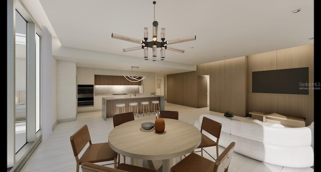 dining area featuring an inviting chandelier