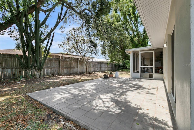 view of patio / terrace with a sunroom