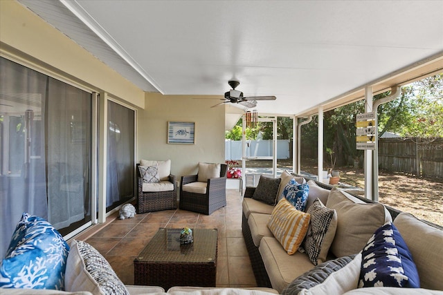 sunroom / solarium with ceiling fan