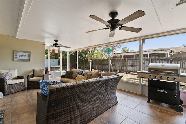 exterior space featuring a wealth of natural light and ceiling fan