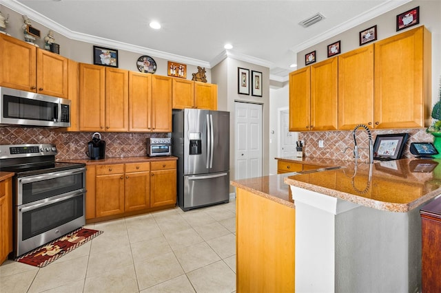 kitchen with decorative backsplash, light tile patterned floors, kitchen peninsula, stainless steel appliances, and crown molding