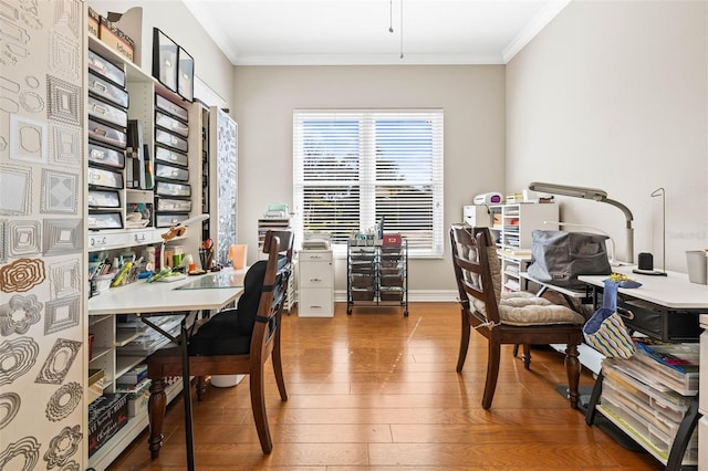 office area featuring crown molding and wood-type flooring