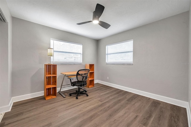 office featuring ceiling fan and dark hardwood / wood-style floors