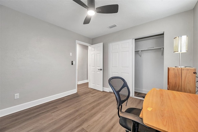 office featuring ceiling fan and hardwood / wood-style flooring