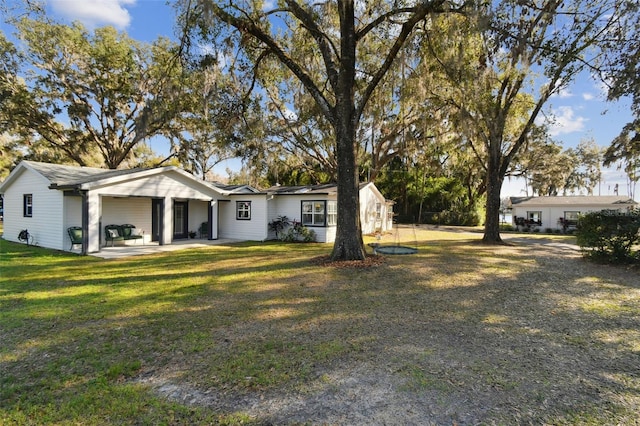 exterior space with a front yard