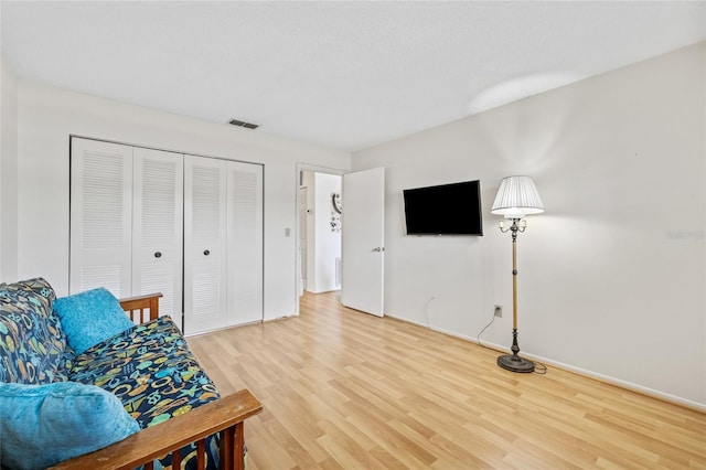 living room with wood-type flooring