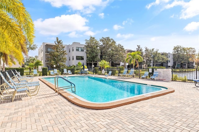 view of pool featuring a patio