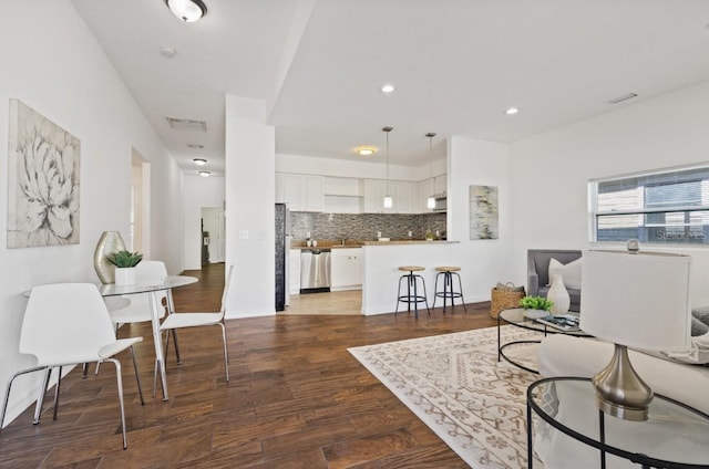 living room featuring dark hardwood / wood-style floors