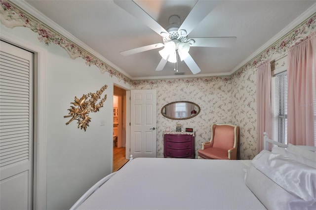 bedroom featuring crown molding and ceiling fan