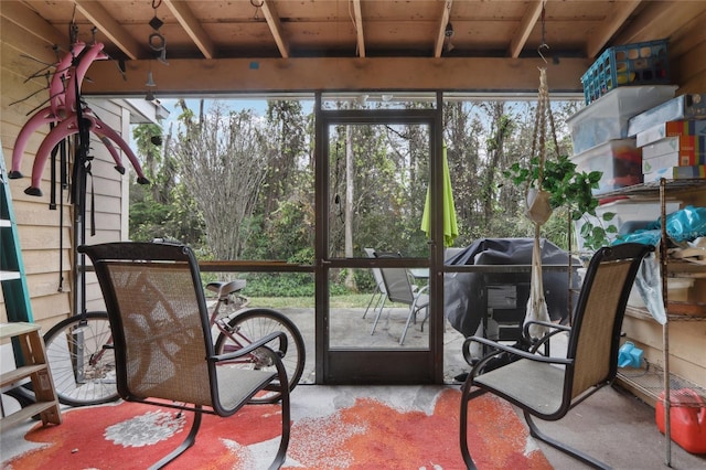 sunroom / solarium featuring wooden ceiling