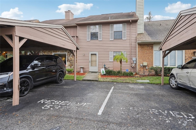 view of car parking with a carport