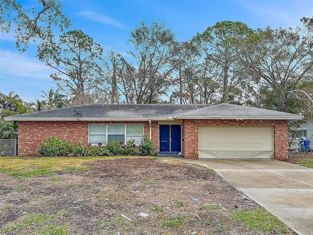 5225 Venetian Blvd NE, Saint Petersburg, FL 33703 - ranch-style house with a garage