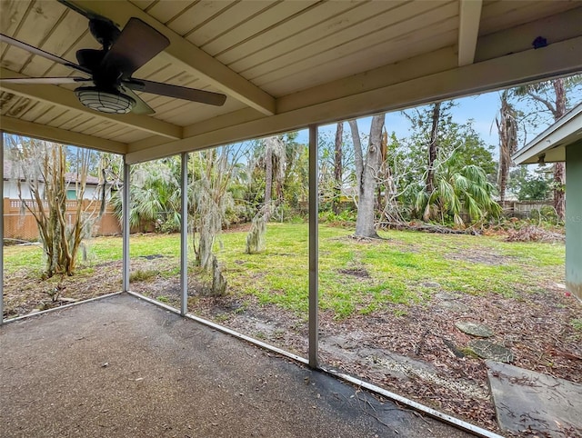 5225 Venetian Blvd NE, Saint Petersburg, FL 33703 - unfurnished sunroom featuring ceiling fan and beam ceiling