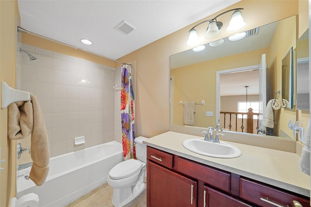 full bathroom with vanity, toilet, and shower / bath combo with shower curtain