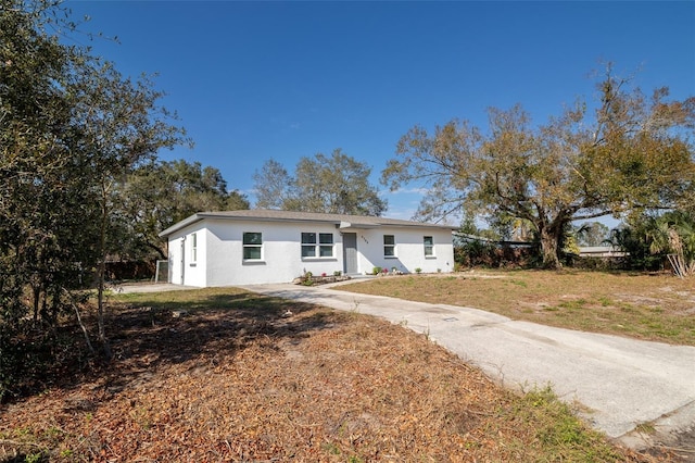 view of front of property with a front lawn