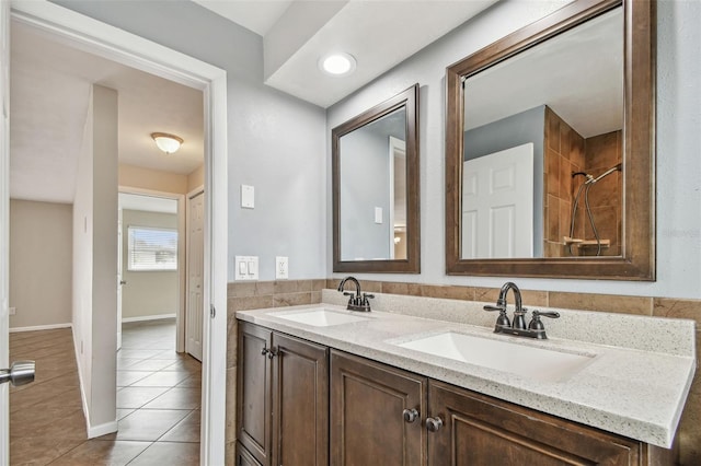 bathroom with vanity and tile patterned floors