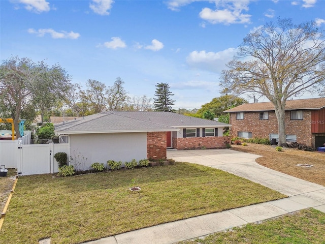 view of front of home with a front lawn