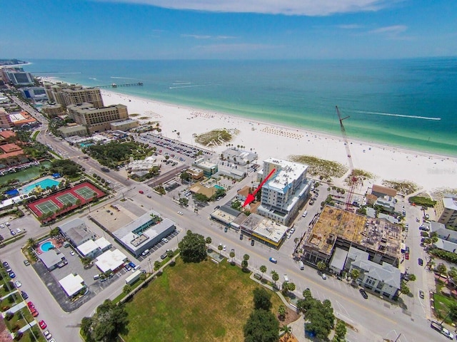 aerial view featuring a water view and a view of the beach