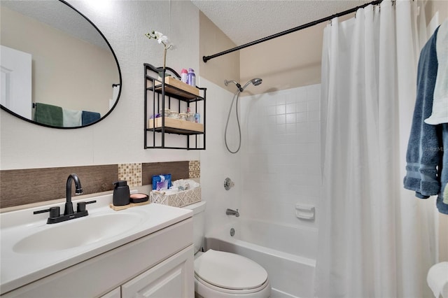 full bathroom featuring vanity, toilet, shower / tub combo, and a textured ceiling